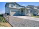 Charming two-story home featuring an attached garage and a welcoming covered front porch at 5805 Red Barn Ave, Mead, CO 80504