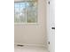 Bedroom with view of trees through the window at 6602 S Vance St, Littleton, CO 80123