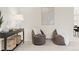 Cozy living space with stylish decor, plush seating, and ample natural light at 6602 S Vance St, Littleton, CO 80123