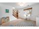 Inviting living room with hardwood floors, a large window, and a cozy reading nook at 6323 W 85Th Ave, Arvada, CO 80003
