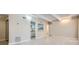 Open floor plan to kitchen and dining area featuring light wood floors, and neutral paint at 9995 E Harvard Ave # 246, Denver, CO 80231