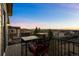 Relax on the balcony with seating and enjoy beautiful sunset views at 2577 Shadecrest Pl, Highlands Ranch, CO 80126