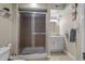 Bathroom with a glass door shower, white vanity and medicine cabinet at 2577 Shadecrest Pl, Highlands Ranch, CO 80126