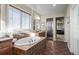 This bathroom features a large soaking tub, shower, and vanity at 2577 Shadecrest Pl, Highlands Ranch, CO 80126