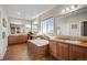 An expansive bathroom featuring large soaking tub and double vanities at 2577 Shadecrest Pl, Highlands Ranch, CO 80126