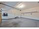 Spacious garage with shelving and storage options at 2577 Shadecrest Pl, Highlands Ranch, CO 80126