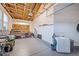 Garage area with sink, workbench and room for storage at 2577 Shadecrest Pl, Highlands Ranch, CO 80126