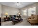 Cozy living room with neutral paint and carpet at 2577 Shadecrest Pl, Highlands Ranch, CO 80126