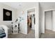 Bright bedroom with walk-in closet, stylish organization, and comfortable atmosphere at 21650 E Tufts Cir, Aurora, CO 80015