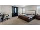 Comfortable bedroom with a designated workspace and natural light at 21650 E Tufts Cir, Aurora, CO 80015