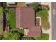 An aerial shot highlights the layout of the property with green lawn and patio at 1982 S Truckee St, Aurora, CO 80013