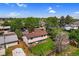 A lovely home and neighborhood with mature trees, well-kept lawns, and a sense of community at 1982 S Truckee St, Aurora, CO 80013