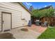 Home backyard featuring a brick patio with a grill, an outdoor seating area, and a wood fence at 1982 S Truckee St, Aurora, CO 80013