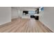 Open-concept living space featuring a kitchen with island and an adjoining dining area at 11902 Octave Ave, Parker, CO 80134