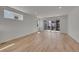 Bright and airy living room with hardwood floors and large windows at 11902 Octave Ave, Parker, CO 80134