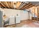 Unfinished laundry room with washer and dryer hookups and exposed ceiling, offering customization potential at 4828 S Nucla Way, Aurora, CO 80015