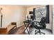 Home office with a desk, multiple monitors, and a comfortable chair, ideal for remote work or study at 4828 S Nucla Way, Aurora, CO 80015