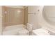 Well-lit bathroom featuring a shower-tub combo with tile surround, modern fixtures, and neutral decor at 12180 Melody Dr # 203, Westminster, CO 80234