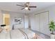 Serene bedroom features a ceiling fan, closet, a dresser, and a calming color palette at 12180 Melody Dr # 203, Westminster, CO 80234