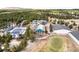 Bird's eye view of the community with a pool, recreation center, and golf course at 19185 Shadowood Dr, Monument, CO 80132