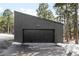 Modern garage with a sleek design, offering ample space and convenient access at 19185 Shadowood Dr, Monument, CO 80132