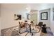 Cozy home office featuring modern decor, a stylish area rug, and plenty of natural light at 19185 Shadowood Dr, Monument, CO 80132