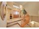 Grand foyer featuring a two-story entrance, tile floors, and elegant chandelier at 8136 S Glencoe Ct, Centennial, CO 80122
