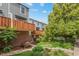 Exterior of home with manicured landscaping, private patios, and mature trees offering shade at 1111 Maxwell Ave # 228, Boulder, CO 80304