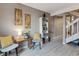 Neutral living area with decoratively adorned walls, pale gray walls and light floors at 1111 Maxwell Ave # 228, Boulder, CO 80304