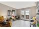 Cozy living room with modern decor, wood floors, bright natural light, and access to a private patio at 1111 Maxwell Ave # 228, Boulder, CO 80304