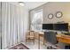 Bright well-lit office with a large wooden desk and great natural light at 1111 Maxwell Ave # 228, Boulder, CO 80304