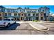 Well-maintained townhome complex with appealing facade, and ample parking at 452 Black Feather Loop # 608, Castle Rock, CO 80104