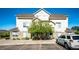 Inviting two-story townhome with well-manicured front yard and convenient parking at 452 Black Feather Loop # 608, Castle Rock, CO 80104
