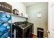 Convenient laundry room features modern washer and dryer, plus ample storage space at 452 Black Feather Loop # 608, Castle Rock, CO 80104