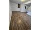 Basement with wood-look floors, neutral walls and recessed lighting at 11761 E Canal Dr, Aurora, CO 80011
