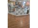 Modern kitchen showcasing stainless steel appliances and an island with mosaic tile at 11761 E Canal Dr, Aurora, CO 80011