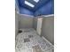Enclosed patio with eye-catching decorative tile at 11761 E Canal Dr, Aurora, CO 80011
