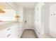 Well-organized closet featuring custom storage solutions, drawers, and ample cabinet space at 140 S Glencoe St, Denver, CO 80246