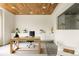 Bright office space features a wood ceiling, built-in storage, and natural light at 140 S Glencoe St, Denver, CO 80246