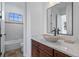Charming bathroom showcasing an eye-catching vessel sink and vanity at 7821 Inverness Blvd, Englewood, CO 80112