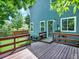 Backyard wooden deck featuring access to the lush, green lawn at 453 Arden Cir, Highlands Ranch, CO 80126