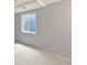 Clean, unfinished basement space with a window and carpeted floors, ready for customization at 453 Arden Cir, Highlands Ranch, CO 80126