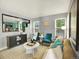 Inviting living area with stylish furnishings and an open view to the kitchen at 453 Arden Cir, Highlands Ranch, CO 80126