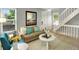 Comfortable living room featuring neutral tones and abundant natural light at 453 Arden Cir, Highlands Ranch, CO 80126