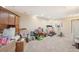 Partially finished basement with exercise equipment and storage at 725 High St, Erie, CO 80516