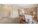 Cozy dining area with wooden chairs and a table, adjacent to the kitchen and other rooms at 725 High St, Erie, CO 80516