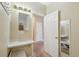 Hallway features a vanity area with good lighting and plenty of storage at 725 High St, Erie, CO 80516