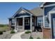 Charming brick and siding home, detailed with a cozy covered front porch at 31353 E 163Rd Ave, Hudson, CO 80642