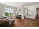 Comfortable sitting area with large windows and hardwood flooring at 31353 E 163Rd Ave, Hudson, CO 80642