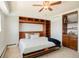 This bedroom boasts built-in shelving, and a comfortable bed at 1029 E 8Th Ave # 1302, Denver, CO 80218